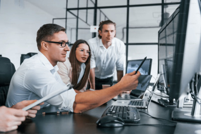 Hiring manager and candidate reviewing a portfolio